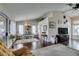 Bright open-concept living room and dining area with hardwood floors at 8808 Litchfield Ave, Las Vegas, NV 89134