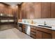 Gourmet kitchen with stainless steel appliances, sleek cabinetry, and a functional layout for cooking at 9 Stonecutter Ct, Henderson, NV 89012