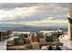 Bright living room featuring a comfortable sectional sofa and amazing city views at 9 Stonecutter Ct, Henderson, NV 89012