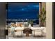 Stylish living room featuring comfortable seating and a view of the city at 9 Stonecutter Ct, Henderson, NV 89012