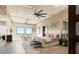 Tranquil main bedroom with a fireplace, seating area, and abundant natural light at 9 Stonecutter Ct, Henderson, NV 89012