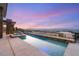 Resort-style pool with a spa, set against a backdrop of stunning mountain and city views, perfect for relaxation at 9 Stonecutter Ct, Henderson, NV 89012