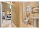 Bright bathroom featuring a pedestal sink and tiled walk-in shower at 917 Collingtree St, Las Vegas, NV 89145