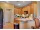 Bright kitchen and dining space with wood cabinets and countertops at 917 Collingtree St, Las Vegas, NV 89145