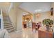 Open-concept dining area features a chandelier and seamless flow to the kitchen at 917 Collingtree St, Las Vegas, NV 89145