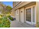 Home entryway featuring manicured landscaping and a walkway leading to a front door at 917 Collingtree St, Las Vegas, NV 89145