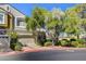 Charming home with a two-car garage, beautiful landscaping, and a welcoming curb appeal at 917 Collingtree St, Las Vegas, NV 89145