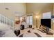 Spacious living room featuring tile flooring, large windows, and an open layout at 917 Collingtree St, Las Vegas, NV 89145