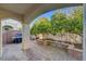 Comfortable patio with built-in BBQ, custom brick pavers, and decorative landscaping at 917 Collingtree St, Las Vegas, NV 89145