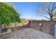 Private outdoor patio with custom pavers and block wall and fencing at 917 Collingtree St, Las Vegas, NV 89145