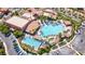 Resort-style pools with lounge areas, cabanas, and manicured landscaping from an aerial view at 1009 Via Canale Dr, Henderson, NV 89011
