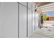 Garage with built-in white cabinets along one wall and punching bag at 1009 Via Canale Dr, Henderson, NV 89011