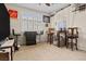 Living area with natural light from shuttered windows, with fun decor and comfortable seating at 1009 Via Canale Dr, Henderson, NV 89011