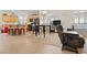 Wide open living room area featuring a breakfast bar and kitchen at 1009 Via Canale Dr, Henderson, NV 89011