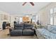Open living room area with neutral colors and a comfortable sofa and daybed at 1009 Via Canale Dr, Henderson, NV 89011