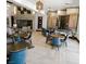 Well-lit lobby with multiple seating areas, a fireplace, and stylish decor at 1009 Via Canale Dr, Henderson, NV 89011