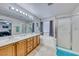 Bright bathroom boasts dual sinks, soaking tub, and a separate shower, perfect for a relaxing experience at 10332 George Hart Ct, Las Vegas, NV 89129