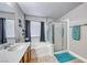 Well-maintained bathroom features a tub, shower, modern fixtures, and ample natural light at 10332 George Hart Ct, Las Vegas, NV 89129