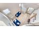 Elegant living room with soaring ceilings, large windows, and tile flooring at 10332 George Hart Ct, Las Vegas, NV 89129
