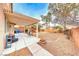 This cozy patio area provides a great space for outdoor entertaining and relaxing at 10332 George Hart Ct, Las Vegas, NV 89129