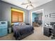 Bedroom featuring unique wall colors, hardwood shutters, and modern appliances at 11504 White Cliffs Ave, Las Vegas, NV 89138