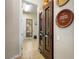 Hallway with a wine cabinet and a view to the exterior at 11504 White Cliffs Ave, Las Vegas, NV 89138