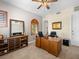 Home office with natural light from shuttered windows, complemented by a wooden desk at 11504 White Cliffs Ave, Las Vegas, NV 89138
