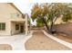 Landscaped backyard with patio and balcony at 1290 Corista Dr, Henderson, NV 89052