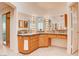 Contemporary bathroom with tile flooring, granite countertops, and Hollywood lighting at 1584 Bermuda Dunes Dr, Boulder City, NV 89005