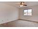 Spacious bedroom offers natural light from window overlooking front yard at 1584 Bermuda Dunes Dr, Boulder City, NV 89005