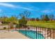 Backyard featuring a private pool overlooking the golf course at 1584 Bermuda Dunes Dr, Boulder City, NV 89005