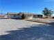 Single-story home with well-maintained yard and gravel landscaping, blending comfort and style at 1681 Appaloosa Ln, Pahrump, NV 89060