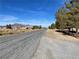 Scenic street with desert landscape and mountain views offering a serene and picturesque setting at 1681 Appaloosa Ln, Pahrump, NV 89060