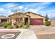 Charming single-story home featuring a well-maintained front yard and a spacious two-car garage at 1859 Hatfields Ct, Henderson, NV 89044