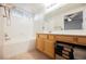 The bathroom features a tub/shower combination and vanity with storage at 204 Mchenry St, Las Vegas, NV 89144