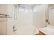 Bathroom featuring a tub/shower combination with a white tile surround at 204 Mchenry St, Las Vegas, NV 89144