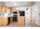 Spacious kitchen with an island, ample cabinetry, and modern appliances offers a functional layout for cooking and entertaining at 204 Mchenry St, Las Vegas, NV 89144