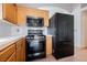 Modern kitchen with stainless steel appliances, bright cabinetry, and a tile backsplash for easy maintenance at 204 Mchenry St, Las Vegas, NV 89144