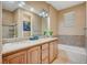 Relaxing bathroom with a soaking tub, double vanity and walk-in shower at 2503 Kaymin Ridge Rd, Henderson, NV 89052