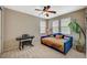 Cozy bedroom with plush daybed, piano, and ample natural light offers a relaxing retreat at 2503 Kaymin Ridge Rd, Henderson, NV 89052