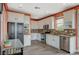 Updated kitchen with stainless steel appliances, granite countertops and modern cabinetry at 2503 Kaymin Ridge Rd, Henderson, NV 89052