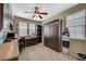 Functional home office with built-in cabinets, desk space, and a sleek Murphy bed at 2503 Kaymin Ridge Rd, Henderson, NV 89052