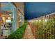 Private outdoor patio features a walkway, garden, and adjacent kitchen with a view to the outside at 2503 Kaymin Ridge Rd, Henderson, NV 89052