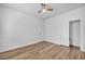 Bedroom featuring wood flooring, ceiling fan, and closet at 2535 Jada Dr, Henderson, NV 89044