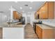 Bright kitchen featuring light wood cabinets, stainless steel appliances, and wood-look flooring for a modern touch at 2535 Jada Dr, Henderson, NV 89044