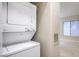 This home features a convenient stacked washer and dryer unit at 3351 Indian Shadow St # 204, Las Vegas, NV 89129