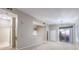 Open concept living room with view of dining area and patio slider at 3351 Indian Shadow St # 204, Las Vegas, NV 89129