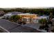 Aerial view of a modern home with a large driveway and three-car garage at 3452 Spanish Winds Ct, Las Vegas, NV 89141