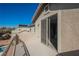 Balcony showing an open sliding glass door and overlooking other homes at 3717 Moonshine Falls Ave, North Las Vegas, NV 89085