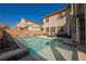 Backyard pool with crystal clear water and a view of the house at 3717 Moonshine Falls Ave, North Las Vegas, NV 89085